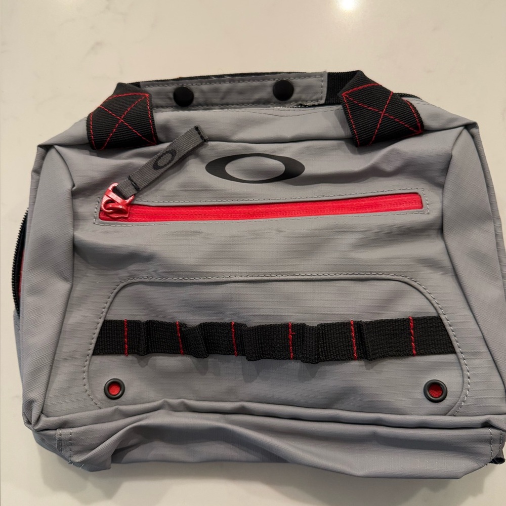 Oakley Gray and Red Toiletry Bag
